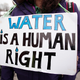 People gather in front of a church before participating in a national milelong march to highlight the push for clean water on Feb. 19, 2016, in Flint, Mich. (Bill Pugliano/Getty Images)